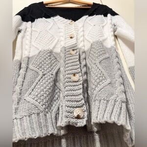 Black, Gray, and White Sweater